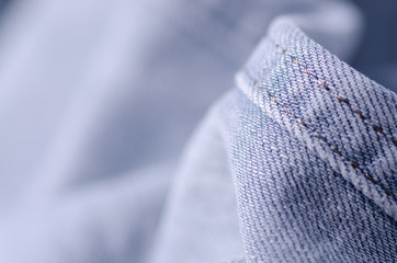 Blue gray jeans fabric macro texture fashion on blur background