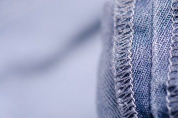 Blue gray jeans fabric macro texture fashion on blur background
