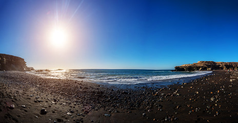 Panorama of sea coast at sunset