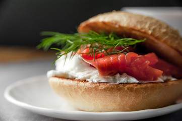 Sandwich with salmon and cream cheese, macro closeup