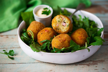 potato croquettes with mortadella.style rustic