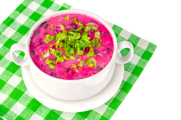 Red beet soup with greens