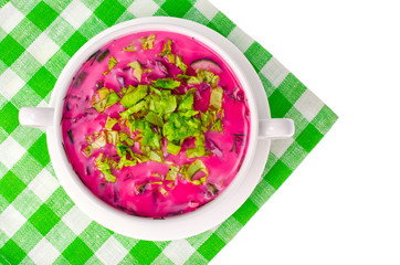 Red beet soup with greens
