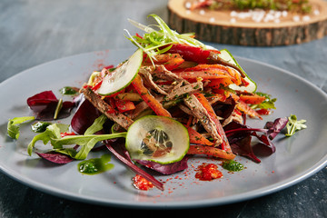 Spicy Salad with Beef, Greens, Pepper, Sesame, Garlic, Chili and Vegetables