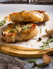 meat grilled rosemary spices wooden background
