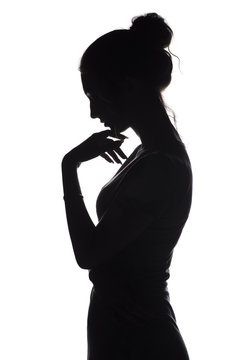 sad woman profile silhouette on black background looking down Stock Photo -  Alamy