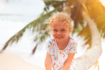 girl on palm tree