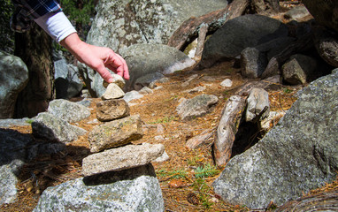 Hand balancing rocks