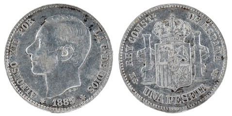 Ancient Spanish silver coin of the King Alfonso XII. 1 peseta. 1885, 18 85 in the stars.