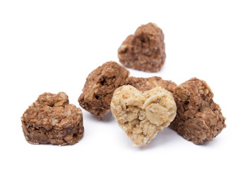 Oatmeal heart dessert isolated on white background