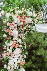High vertical composition from flowers on a wedding arch