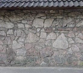 Old hand made stone wall background