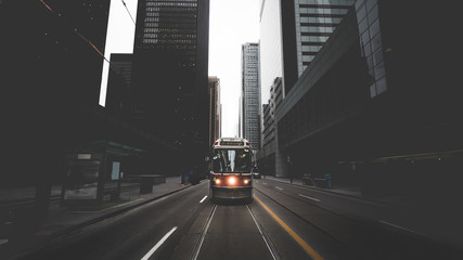 a moody street with buildings in a city 