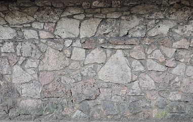Old hand made stone wall background