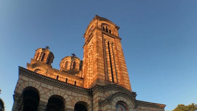 Tilting shot of church of saint Marko in Belgrade, sunset