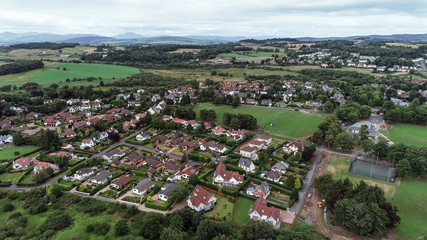 Aerial image over the village of Kilmacolm in West Central Scotland.