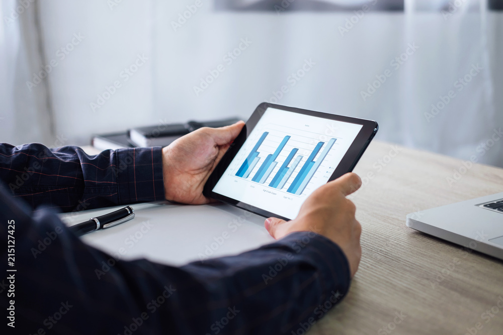 Poster professional at work, businessman using tablet working analysis investment connection at modern work