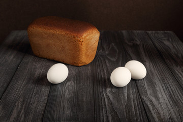 Still life, rye bread with boiled eggs.