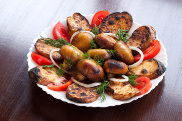 Fresh grilled vegetables in a white dish