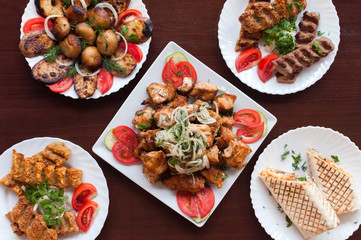 Mix kebab on a plate top view