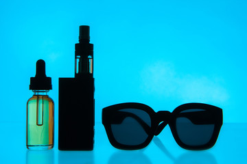 Mod for smoking. Bottle with liquid for electronic cigarette. Concept VAPE.