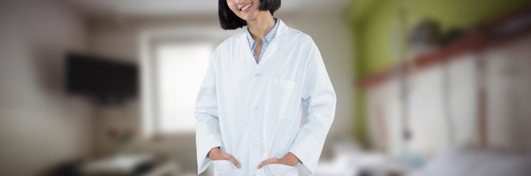 Composite image of doctor standing with hands in pocket against