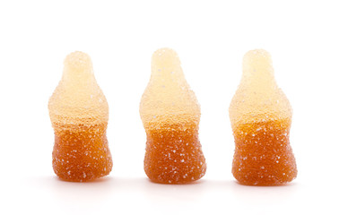 Sweet and Sour Gummy Cola Bottles on a White Background