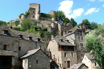 Castle and old stone houses of the medieval village Belcastel, Aveyron, France 
