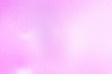 An abstract pale pink background with purple waves, interference, moire