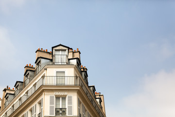 Fototapeta na wymiar Paris Roofline Against a Blue Sky