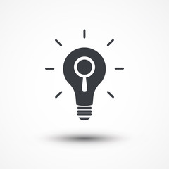 Looking For An Idea. Magnifying glass search light bulb icon