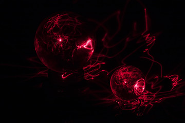 Red Laser Interacts with Two Crystal Balls