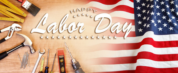 Fototapeta na wymiar American flag and tools. Happy labor day