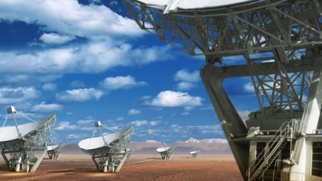 Camera Moving To Reveal Several Radio Telescopes. Beautiful Clouds Move Across Horizon. Advanced Technology Telecommunication System.