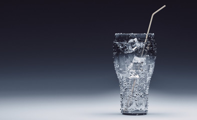 Mockup Beverage. Cold clear water or cold transparent soda with ice cubes and straw on dark background.   billboard banner template mockup with place for text and logo