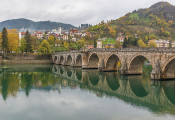 Fototapeta premium Visegrad, Bosnia & Herzegovina - the Mehmed Paša Sokolovic Bridge is one of the main landmarks in the country, and Visegrad one of the pearls of the Balkans