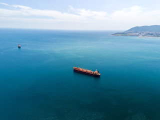 Large bulk carrier in the sea, aerial view.