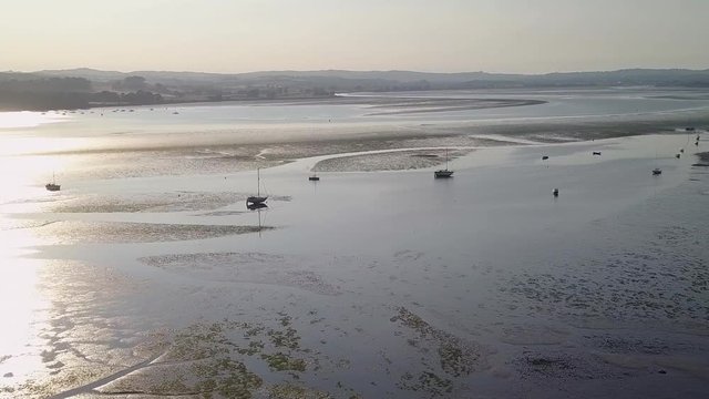 Seabed, low tide, stranded yachts. Lympstone. England. Aerial view.