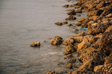Coast. Sea waves. Stone beach. Mediterranean Sea. Place for inspiration. Background for travel company. Rest on the sea.