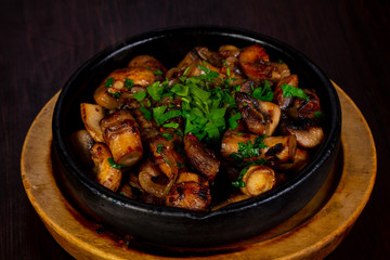 Roasted mushrooms in the pan