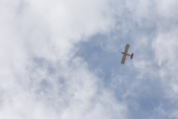 Looking up at an airplane flying overhead