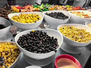 Marinated green and black olives