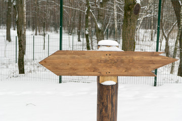 A null pointer in a forest in winter. Place for your text.