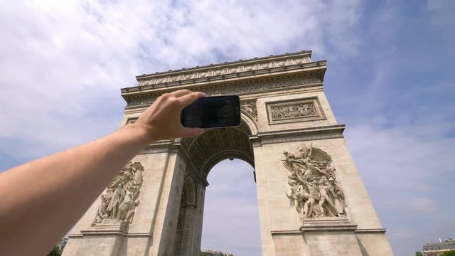 Professional video series of POV taking selfie on Arc de Triomphe in Paris in 4K slow motion 60fps