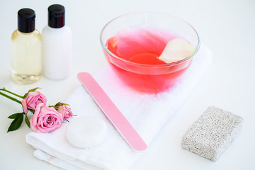 Wellness Products and Cosmetics. Spa still life with blossoms of rose and essential oils