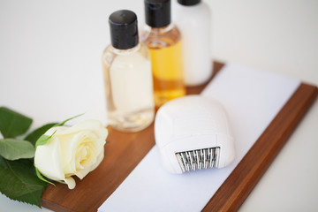 Wellness Products and Cosmetics. Spa still life with blossoms of rose and essential oils