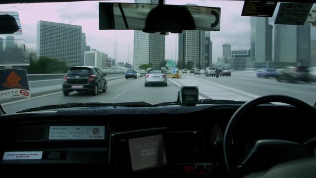 Timelapse POV of drive with steering wheel Singapore Asia