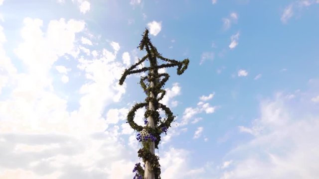 Swedish Midsummer Pole. Traditional Midsummer Festival At Skansen. Travel Sweden.