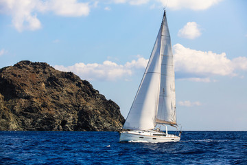 Obraz premium Sailing among Greek islands in Aegean Sea. Luxury yachting.