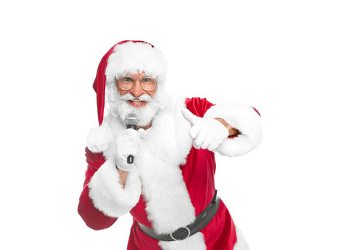 Santa Claus singing into microphone on white background. Christmas music